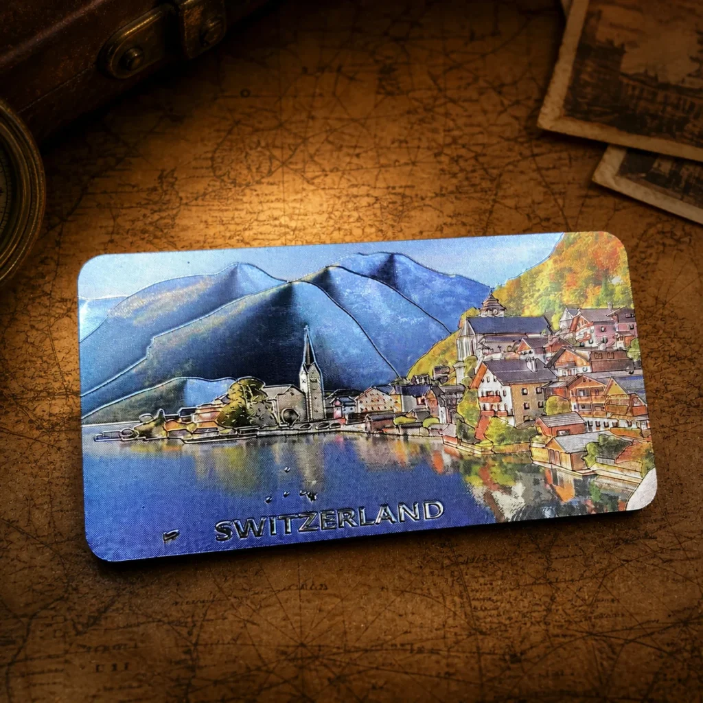 Custom aluminum foil Switzerland souvenir fridge magnet on a dark travel map