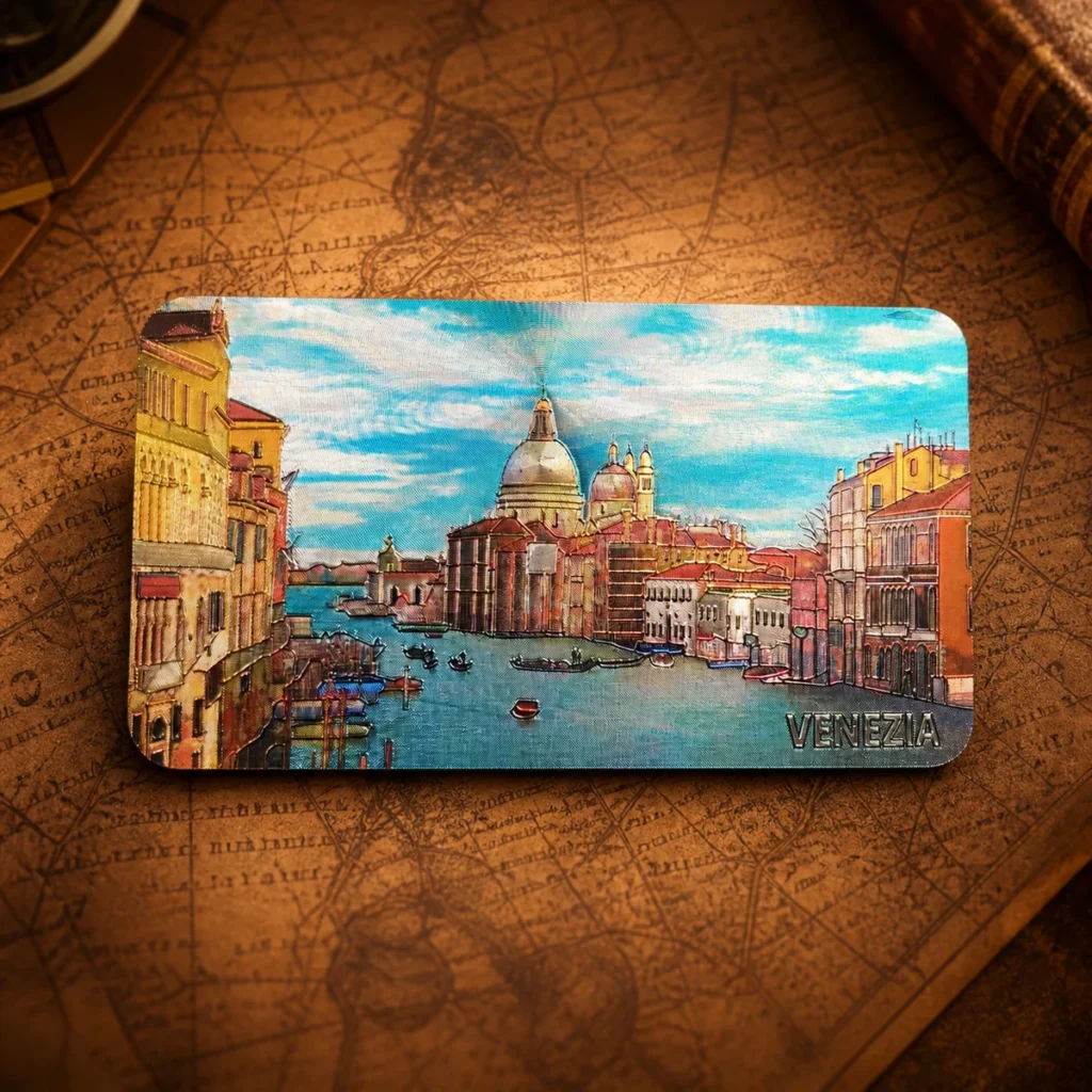Custom aluminum foil Venice souvenir fridge magnet on a dark travel map