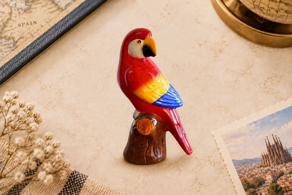 Ceramic souvenir figurine featuring a Costa Rica macaw design