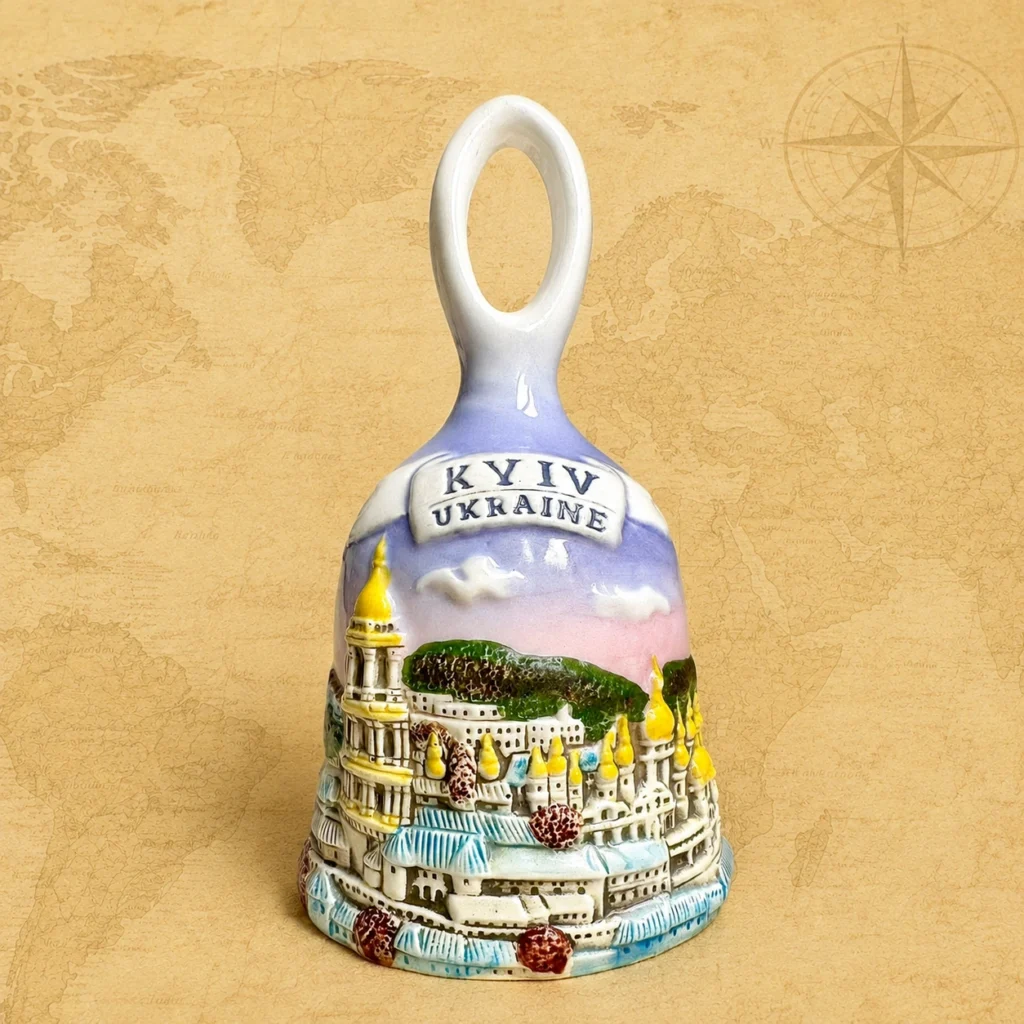 Ceramic souvenir bell featuring Kyiv, Ukraine city landmark theme