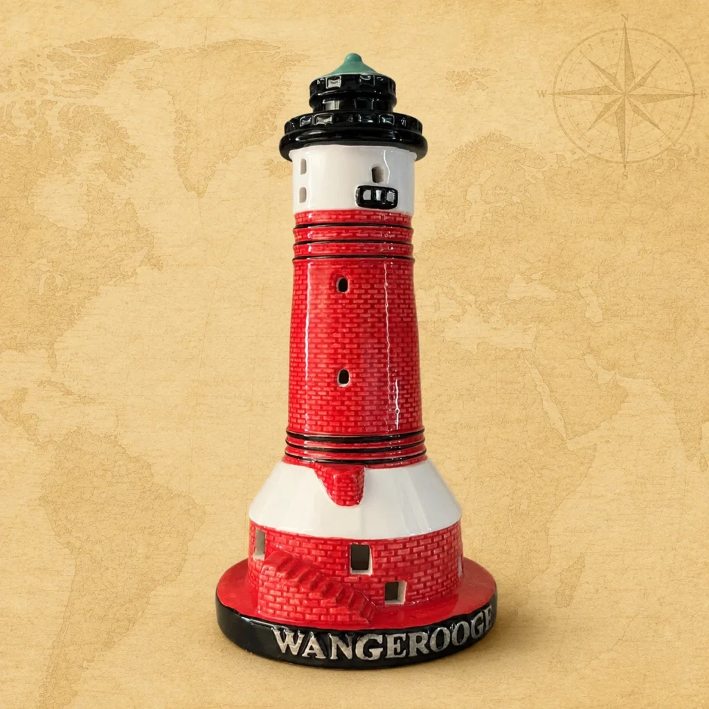 Ceramic souvenir candle holder featuring Pilsum Lighthouse in Lower Saxony, Germany