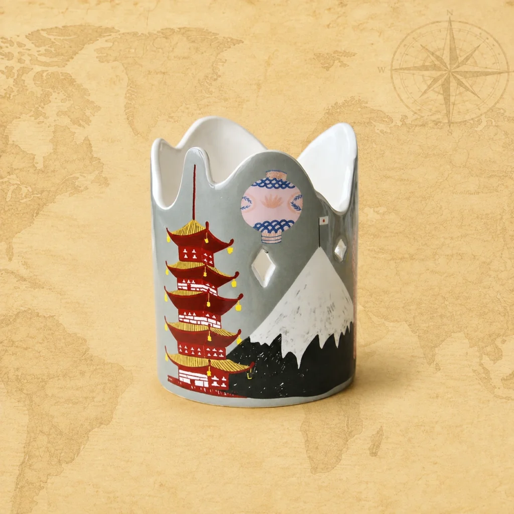 Ceramic souvenir candle holder featuring Tokyo, Japan city landmark theme