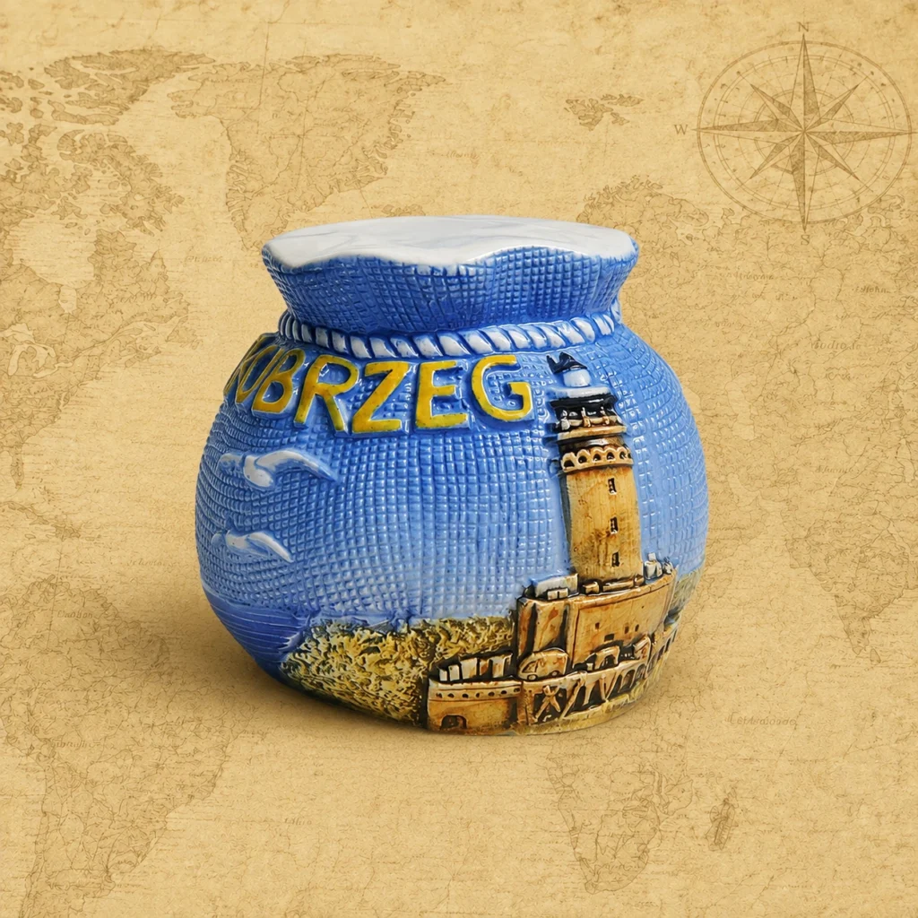 Ceramic souvenir piggy bank featuring Kolobrzeg, Poland Baltic coastal theme