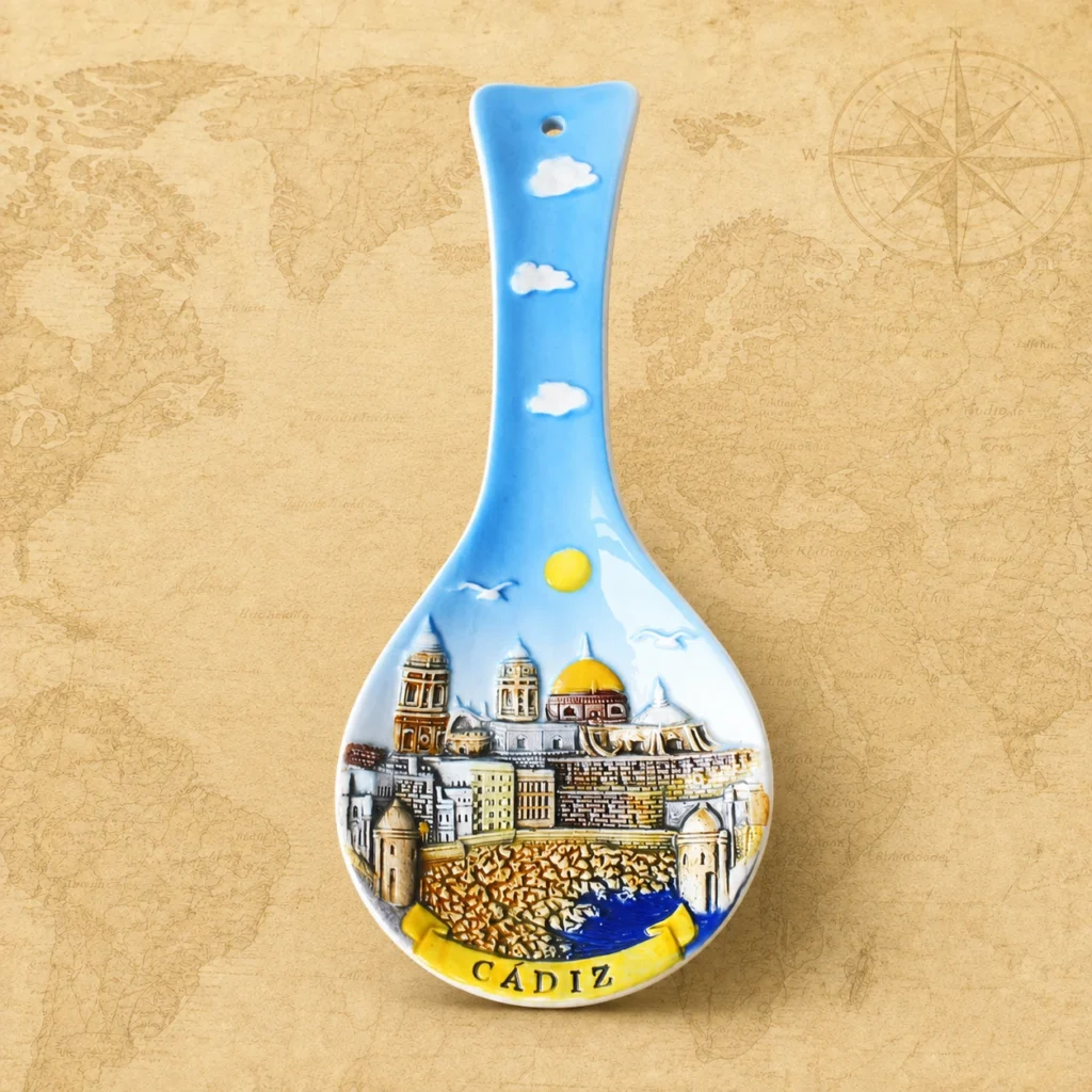 Ceramic souvenir spoon featuring Cadiz, Spain coastal city theme