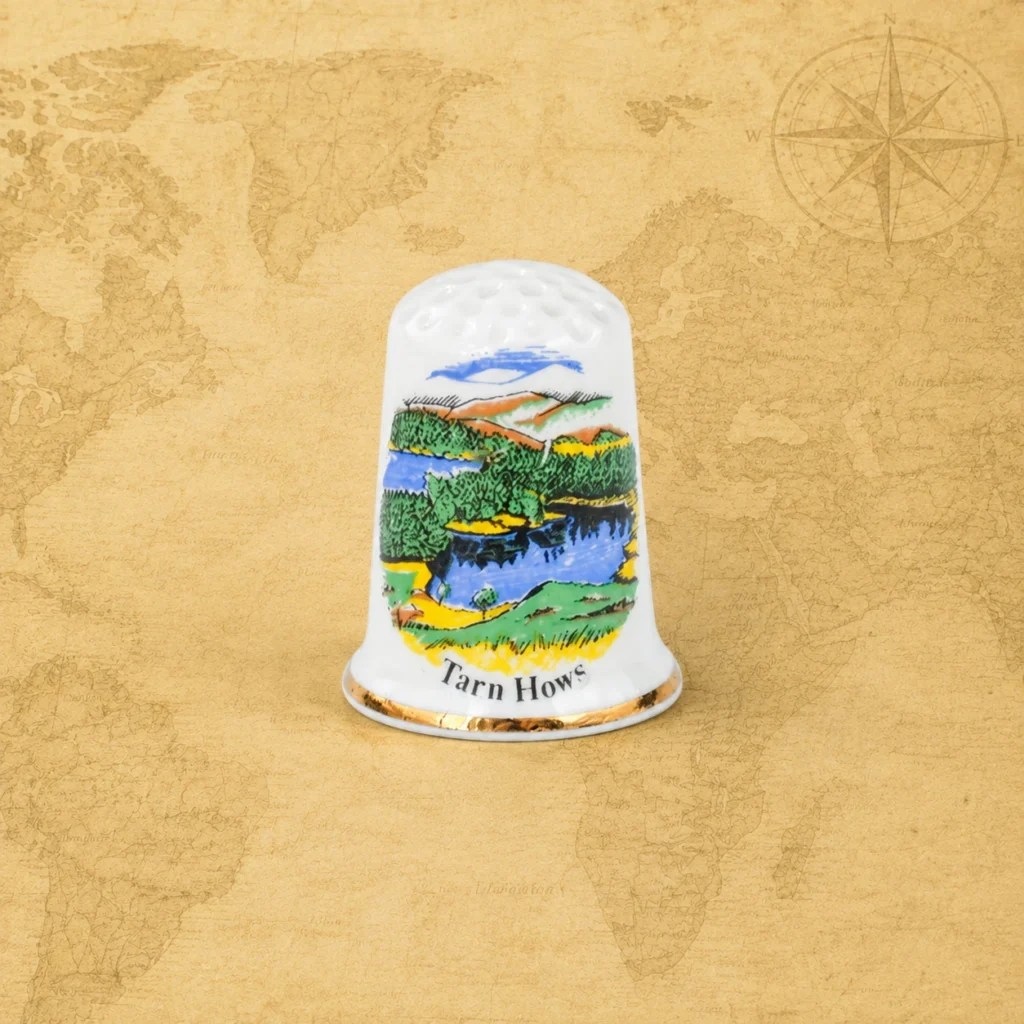 Ceramic souvenir thimble featuring Tarn Hows in Cumbria, England, United Kingdom