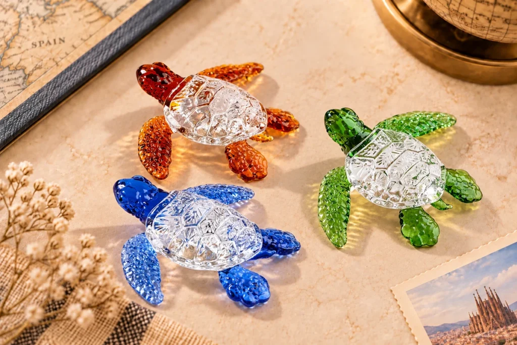 Amber, green and blue glass sea turtle souvenir figurines