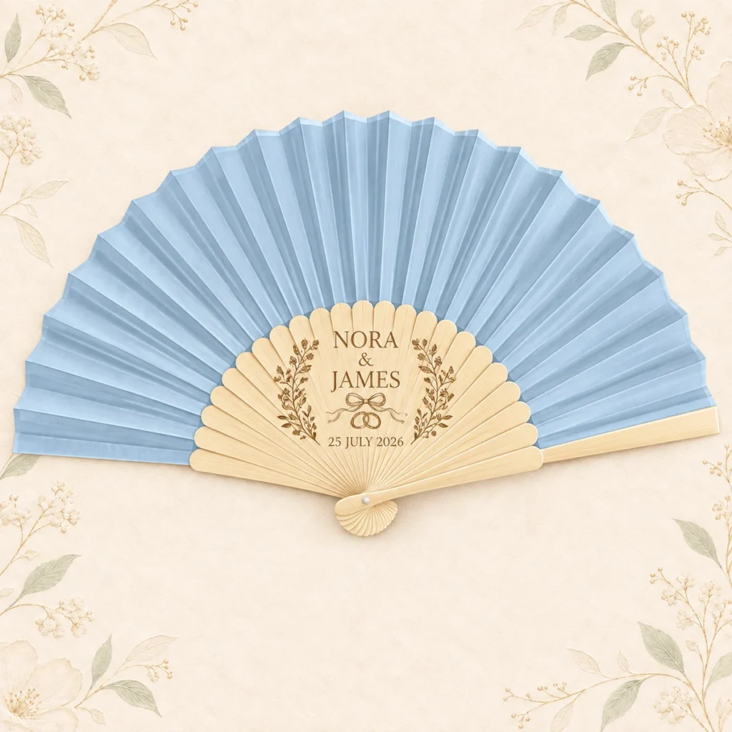 Powder blue folding fan for Nora and James dated 25 July 2026