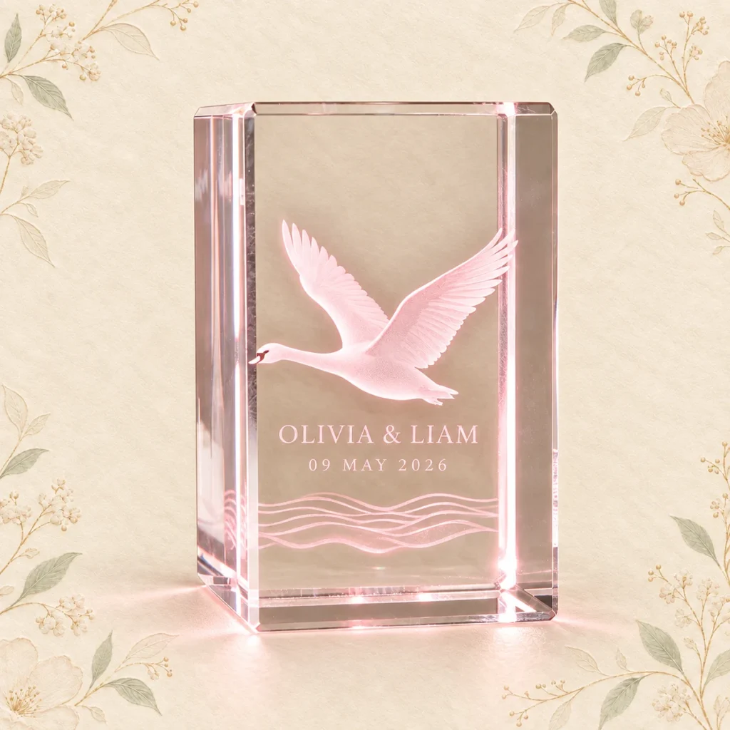 Blush swan crystal favor for Olivia and Liam dated 9 May 2026