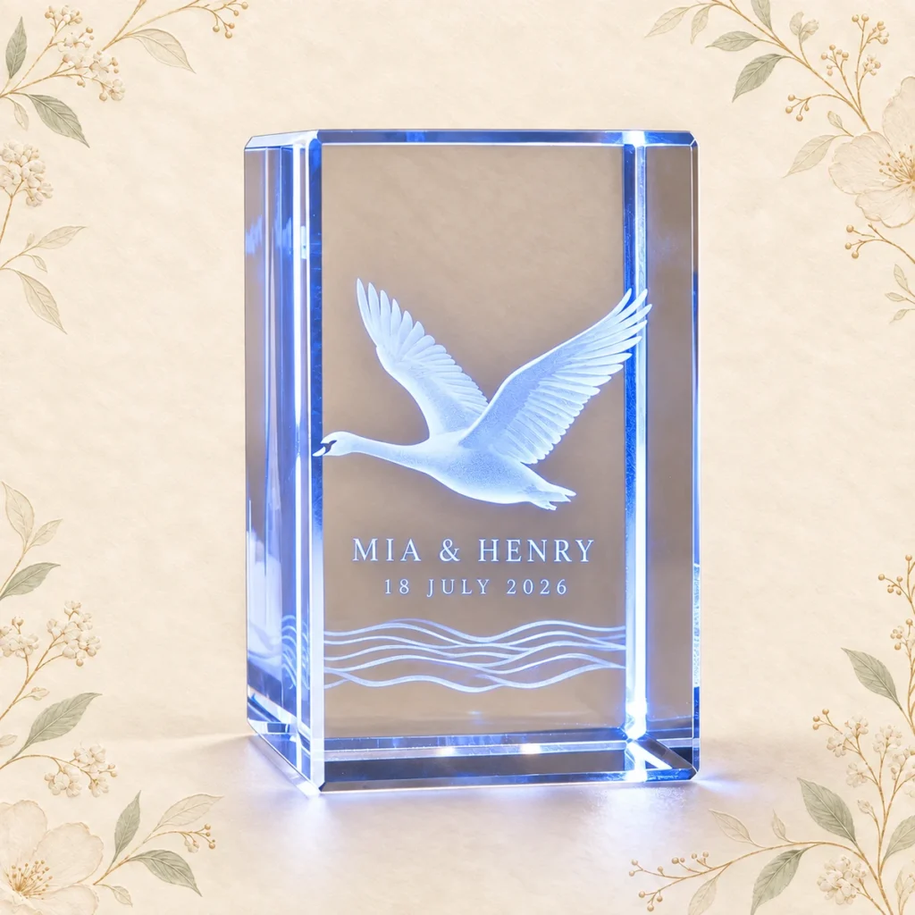 Blue swan crystal favor for Mia and Henry dated 18 July 2026