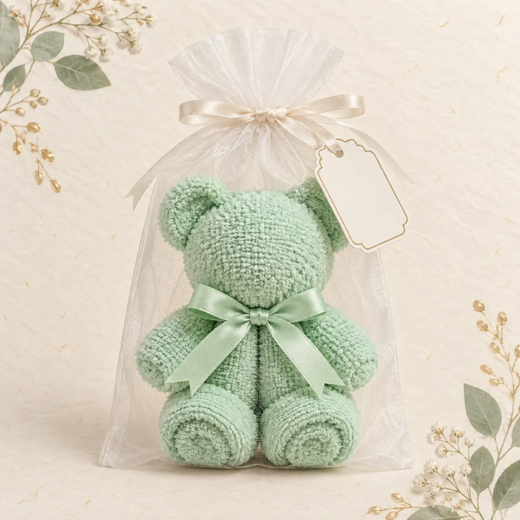 Mint green folded towel teddy bear baby shower favor