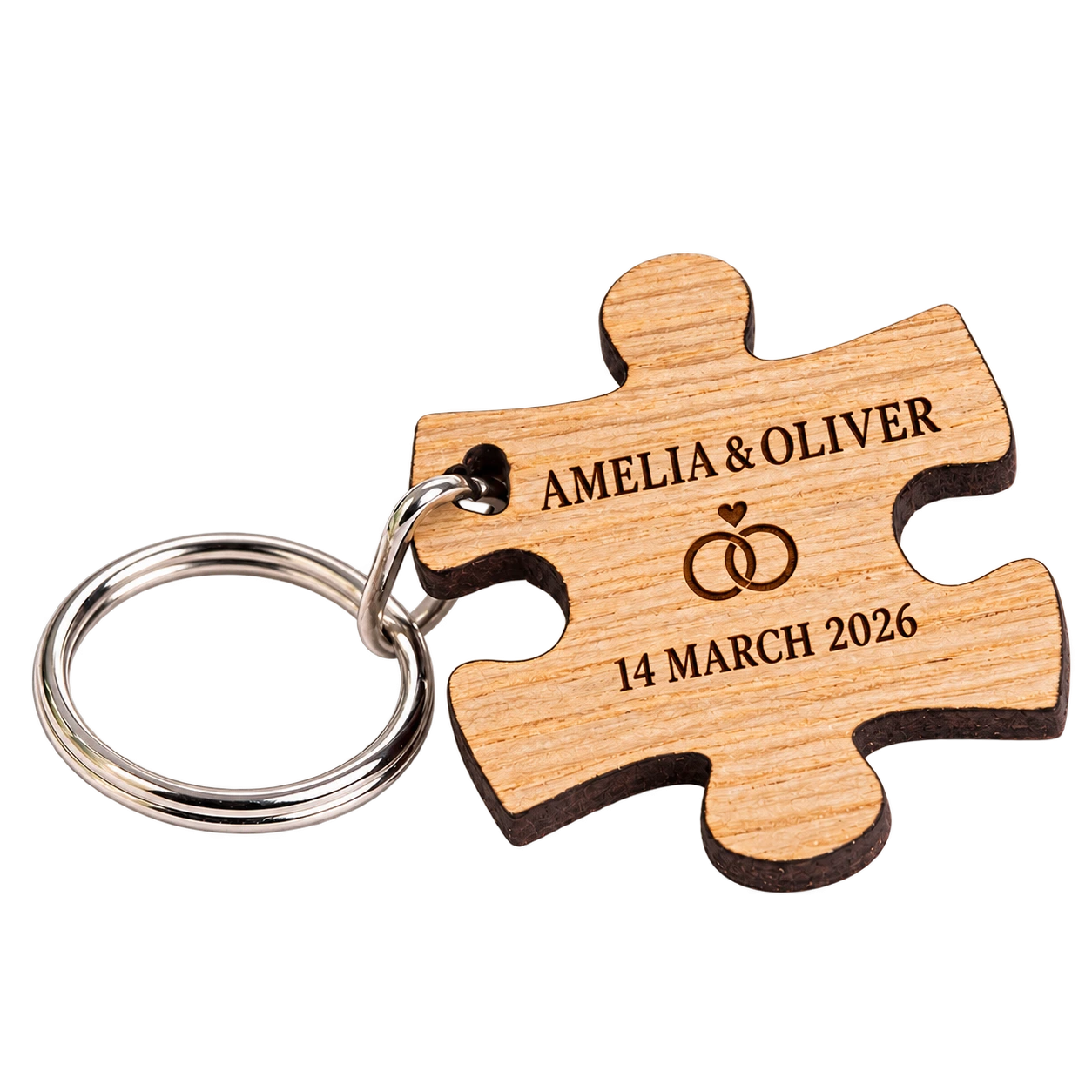 Oak puzzle keyring for Amelia and Oliver dated 14 March 2026
