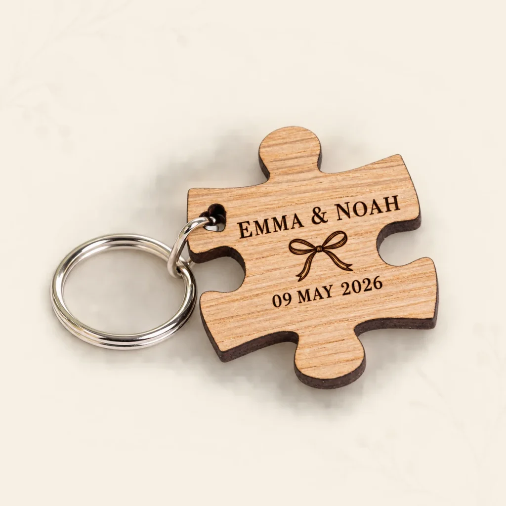 Oak puzzle keyring for Emma and Noah dated 9 May 2026